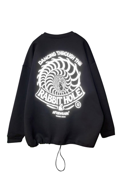 Unisex Black Oversize Sweatshirt – 'Dancing Through the Rabbit Hole'.