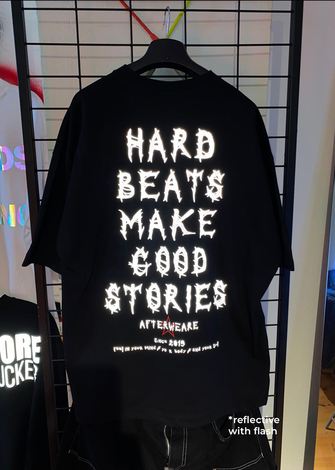 OVERSIZE BLACK T-SHIRT 'HARD BEATS MAKE GOOD STORIES'.