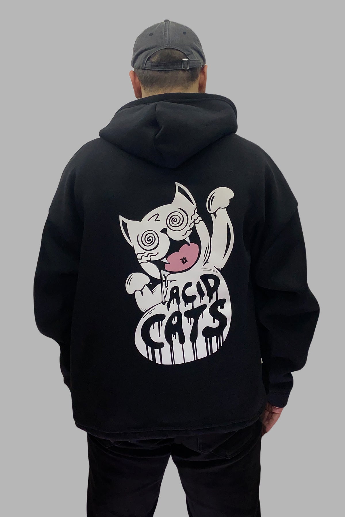 SCHWARZER OVERSIZE-HOODIE „ACID CATS“ REFLEKTIEREND