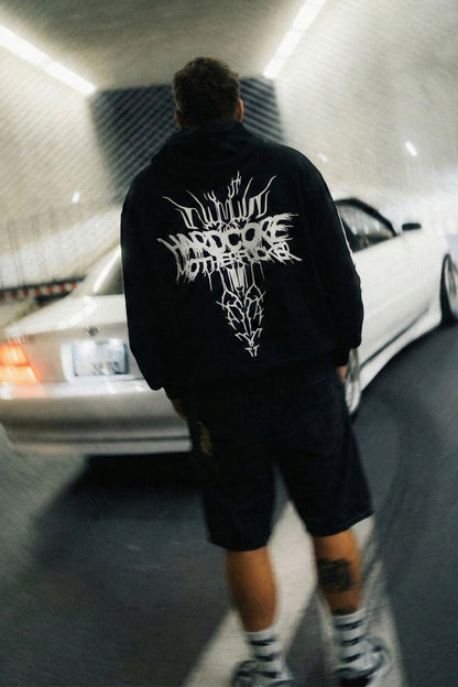 SCHWARZER OVERSIZE-HOODIE „HARDCORE TRIBAL“ REFLEKTIEREND