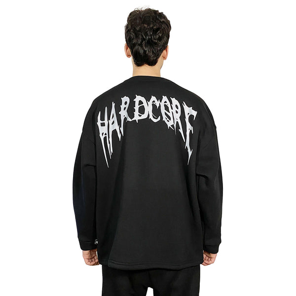 siyah sweatshirt sırtında hardcore baskısı var reflektörlü